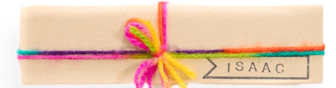 Finished crayon name gift box, tied with colorful yarn and stamped with the name